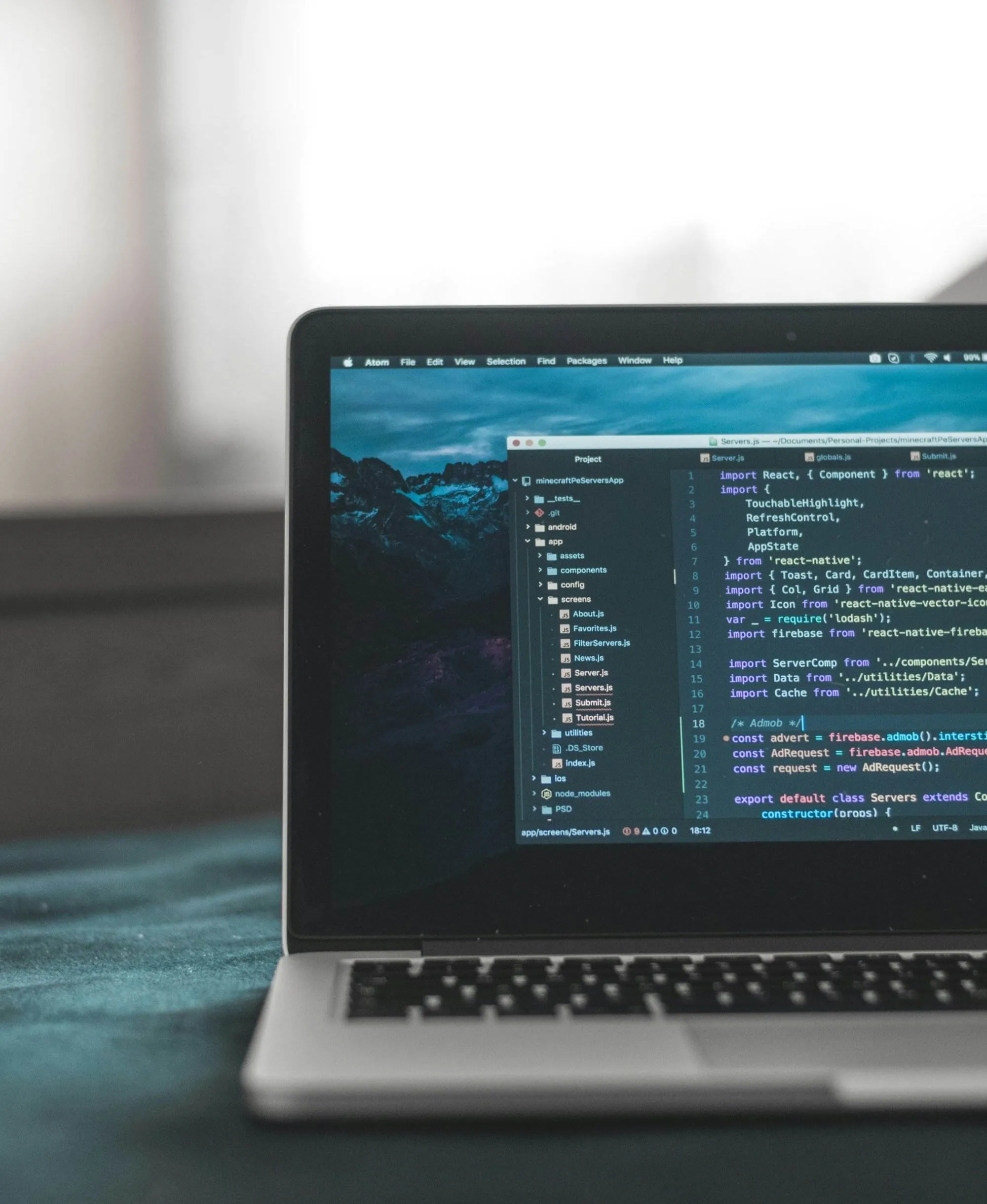 This is a image with a laptop to develop a specific code in it.